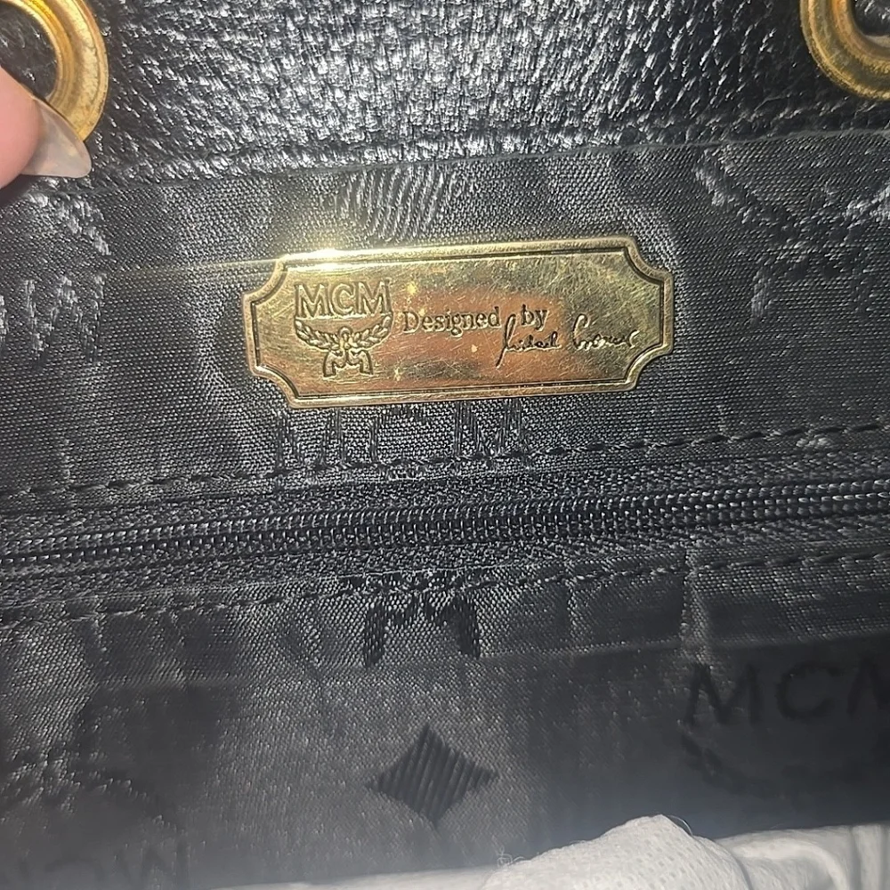 MCM Black Leather Logo Studded Backpack with Gold Hardware comes with COA